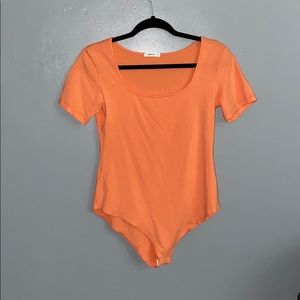 Orange bodysuit
